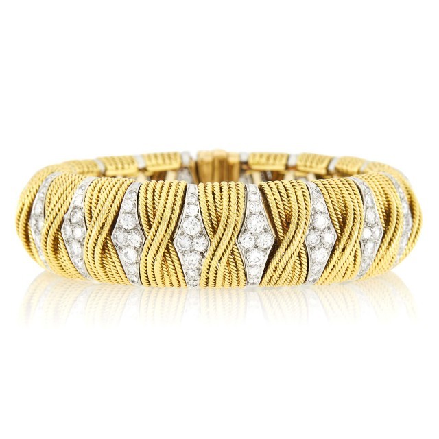 Van Cleef and Arpels Gold, Platinum and Diamond 'Sabre Japonais' Bracelet, circa 1958. Est. $25,000-35,000. Lot 110. Auction Oct 21.