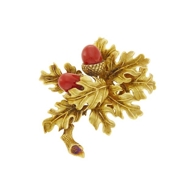Tiffany and Co. Gold and Oxblood Coral Brooch. Sold for $6,300 