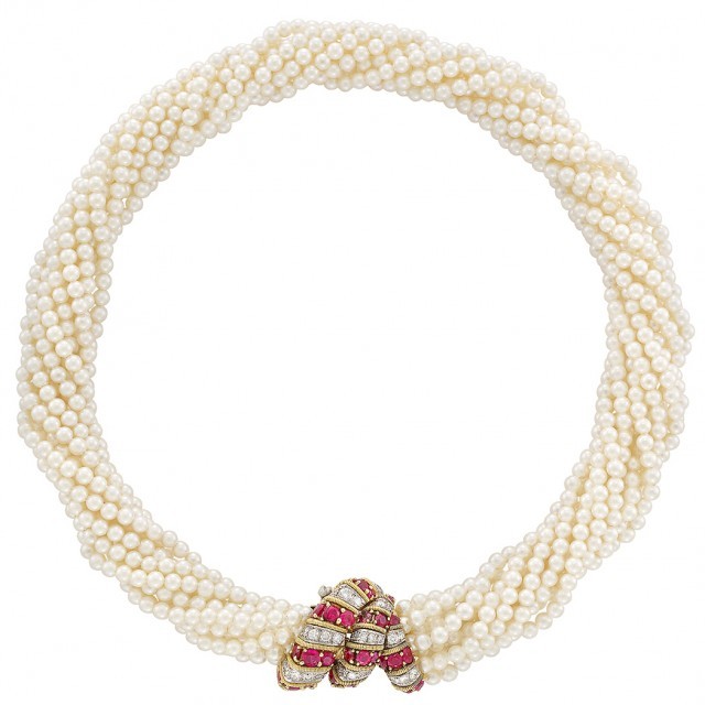 Ten Strand Cultured Pearl Torsade Necklace with Gold, Platinum, Ruby and Diamond Clasp, Marchak, France. Sold for $8,750.
